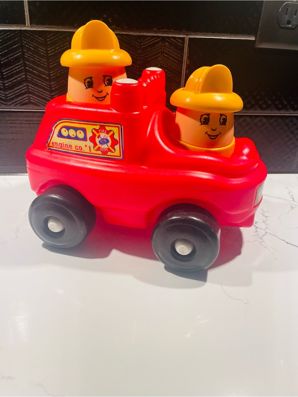 Vintage Step2 chunky plastic fire truck toy from the 1990s
